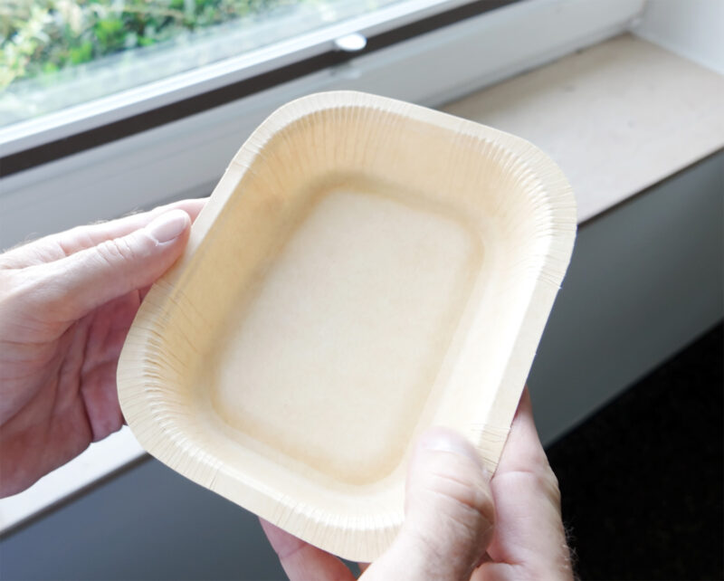 Hand holding Walki Pack Tray UR brown 